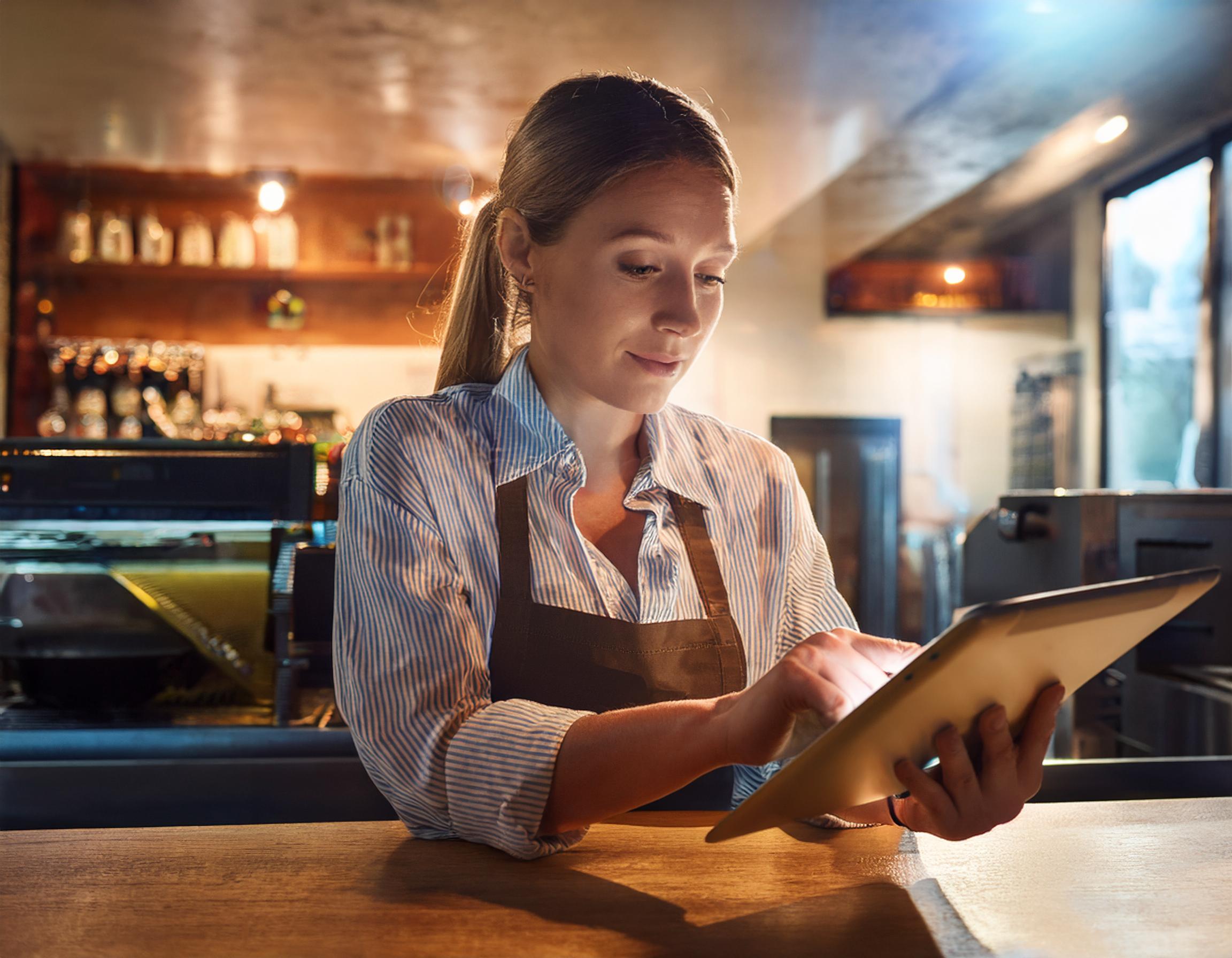 restaurant owner checking the status of refrigeration units